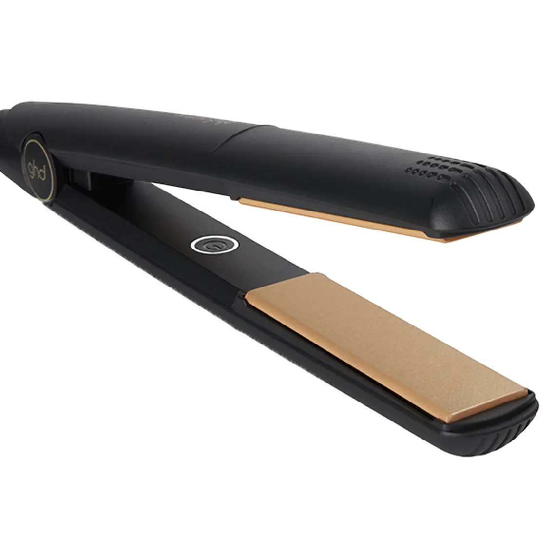 Black and gold hair straightener on a white background