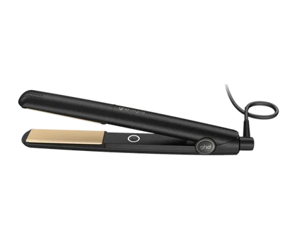 Black hair straightener with gold accents on a white background