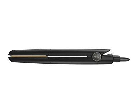 Black hair straightener with gold accents on a white background