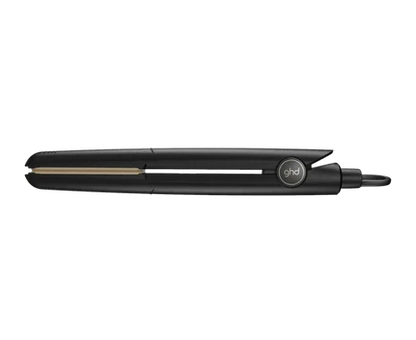 Black hair straightener with gold accents on a white background