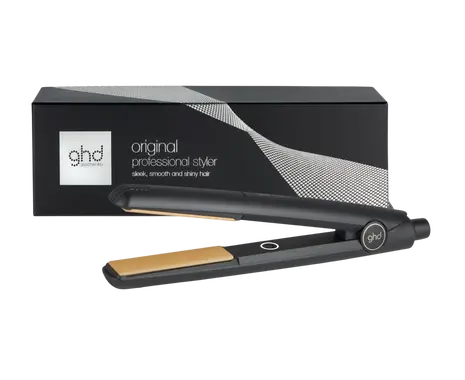 ghd hair straightener with packaging on a white background