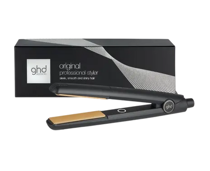 ghd hair straightener with packaging on a white background