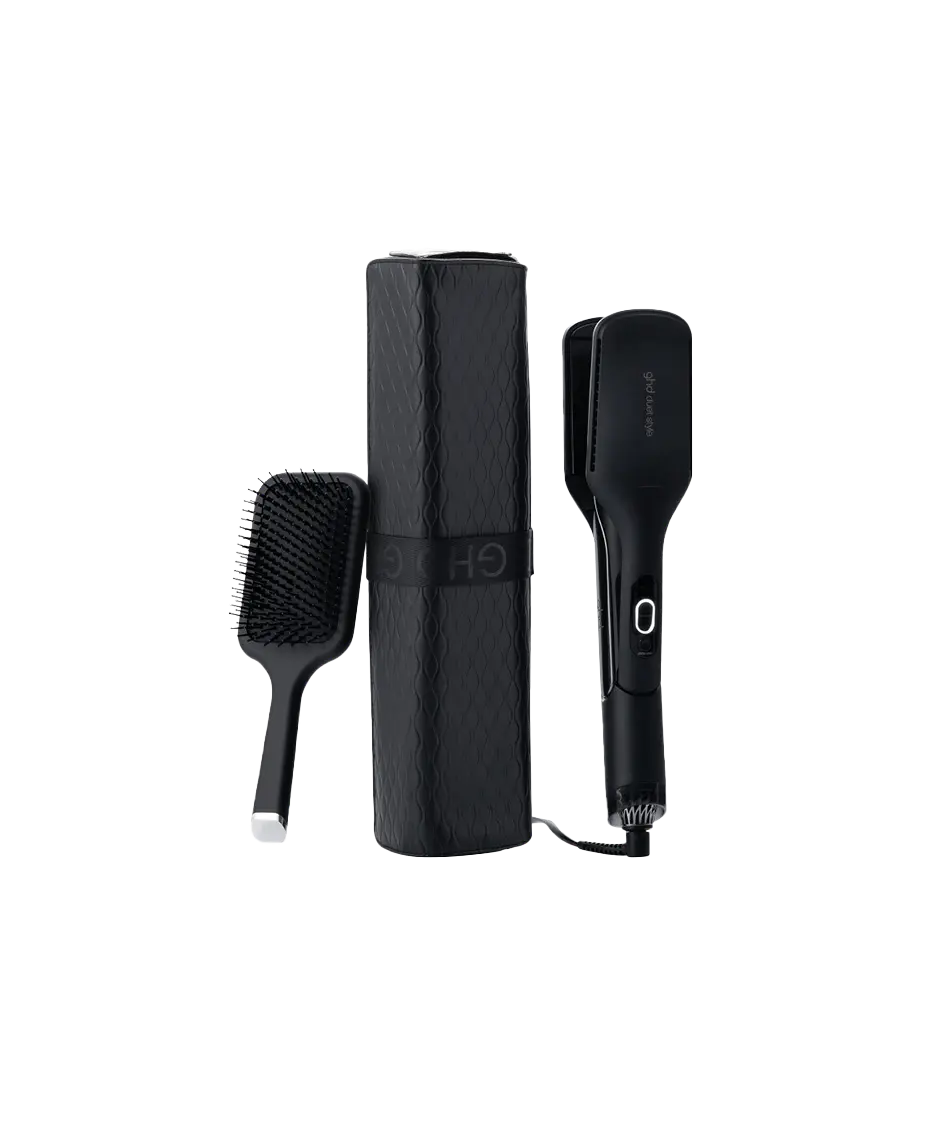 Black hair styling tool set with paddle brush and straightener on a white background