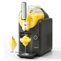 Devanti frozen yogurt and ice cream machine with a glass of yellow dessert on a white background