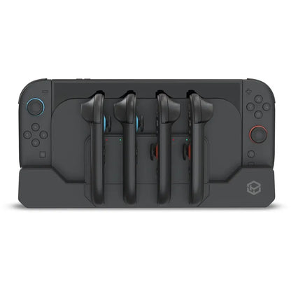 Gaming console with four controllers on a white background