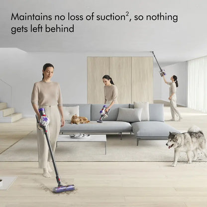 Woman cleaning a living room with a vacuum cleaner, with text about suction power.