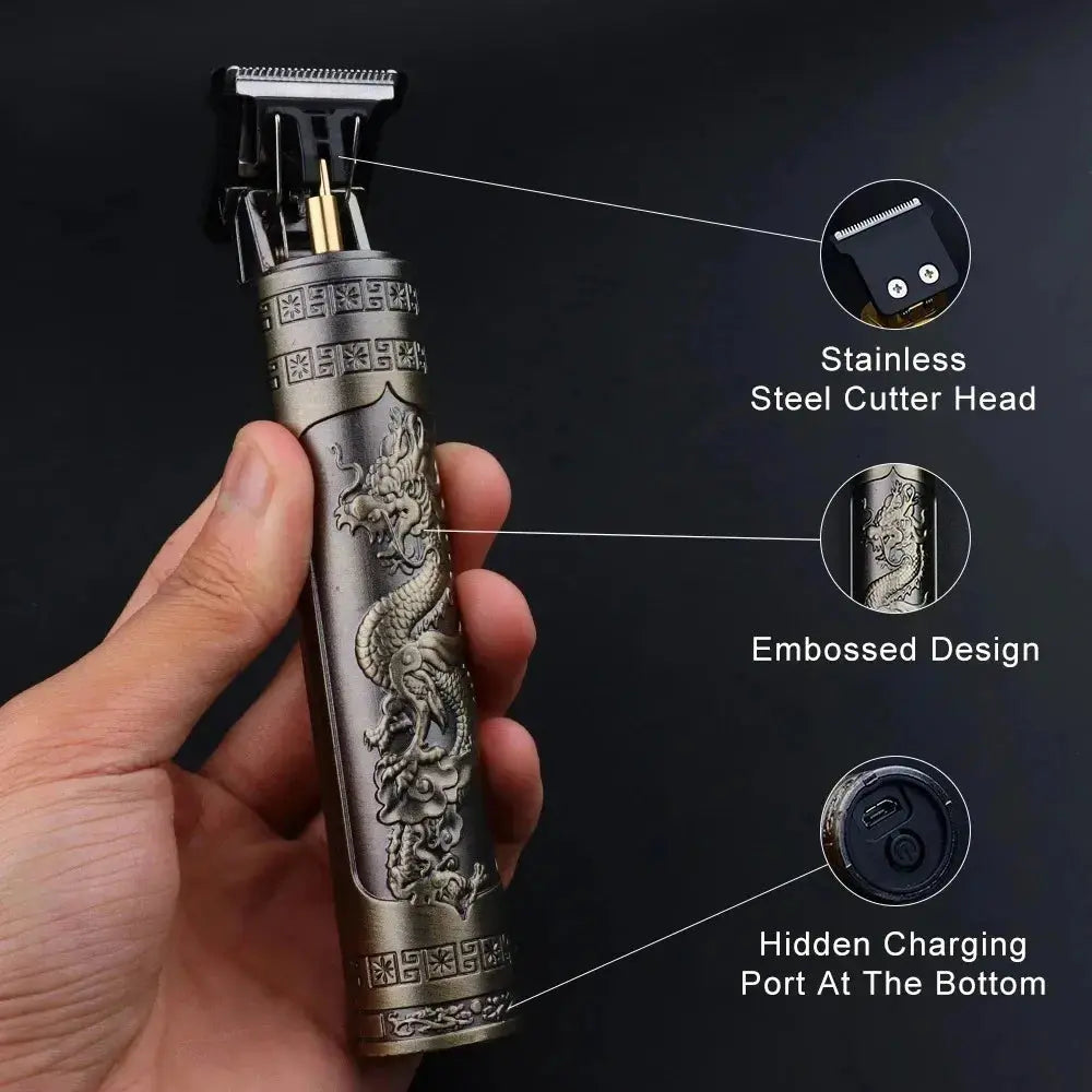 Hand holding a metallic hair trimmer with embossed design and features highlighted on a black background