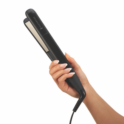 Remington Ceramic Straightener 215 held in hand