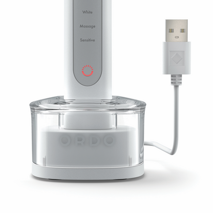 Ordo Sonic Plus electric toothbrush with USB charging base