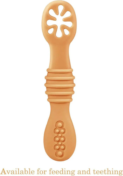 Orange baby teether on a white background