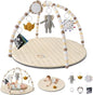 Baby play gym with hanging toys and a mat on a white background
