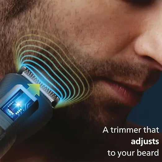 Close-up of a man using an electric trimmer on his beard with a focus on the device's design.