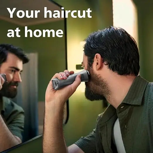 Man using a hair trimmer in front of a mirror with text 'Your haircut at home'.
