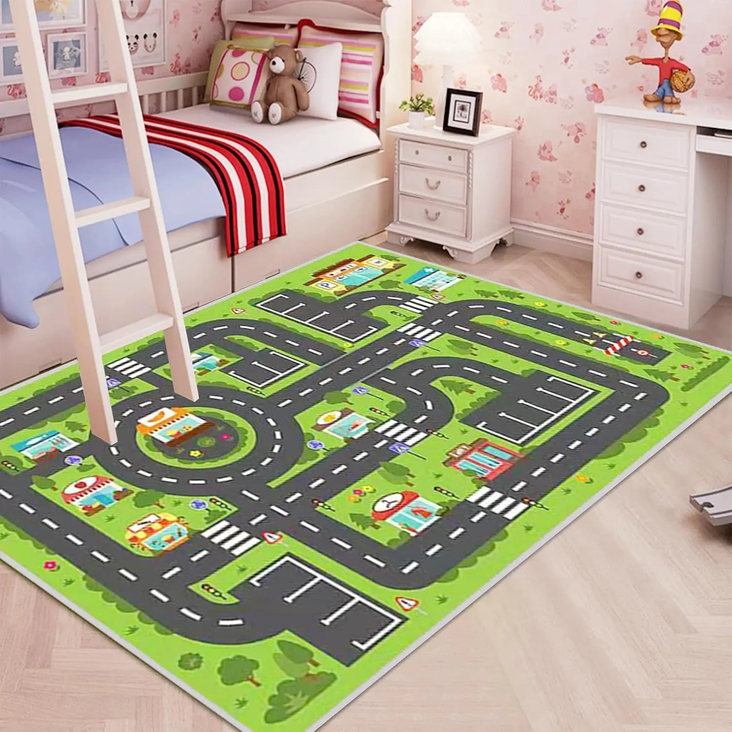 Children's room with a road map play mat on the floor.