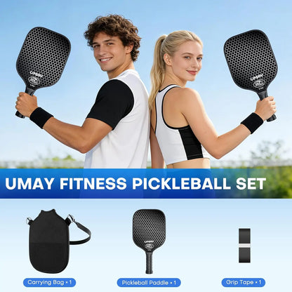Two people holding pickleball paddles with Umay Fitness branding against a clear sky.