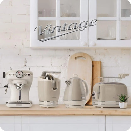 Kitchen appliances including a coffee machine, kettle, and toaster on a wooden countertop with a 'Vintage' sign in the background.