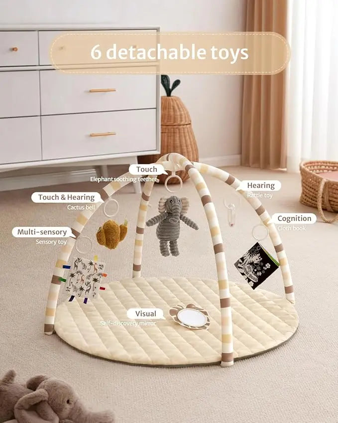 Baby play gym with detachable toys in a room setting
