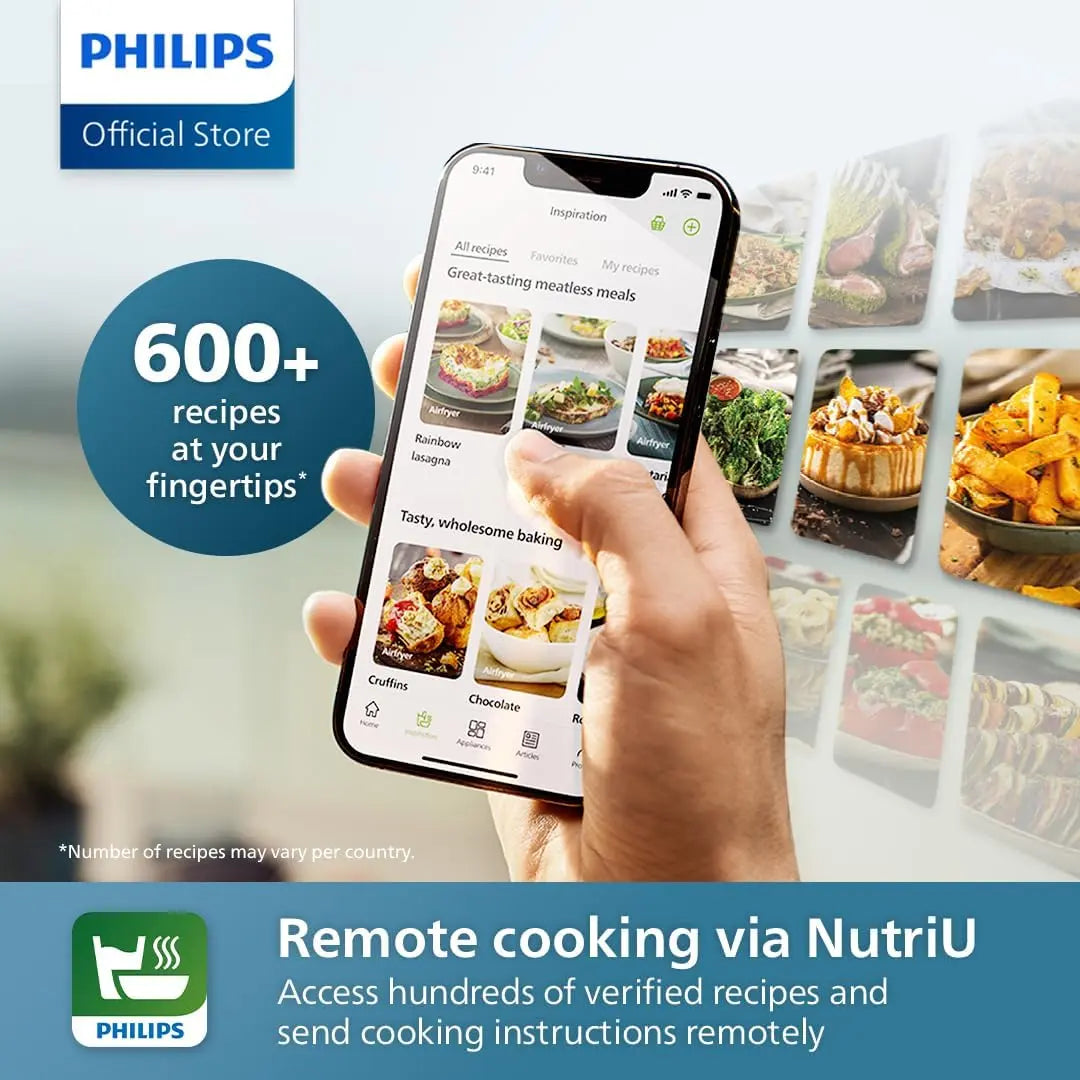 Hand holding a smartphone displaying a cooking app with Philips branding and text about remote cooking.