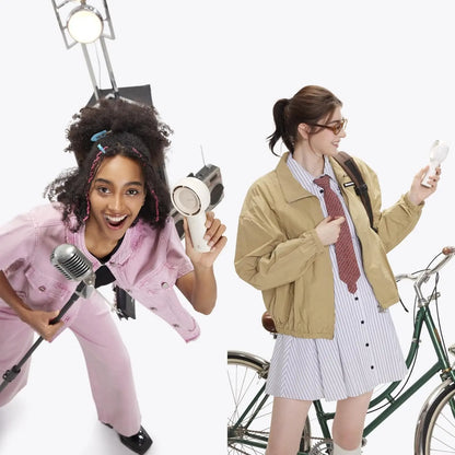 Two women in different outfits with props on a white background