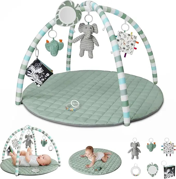 Baby play gym with toys and a baby lying on a mat