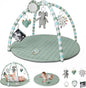 Baby play gym with toys and a baby lying on a mat