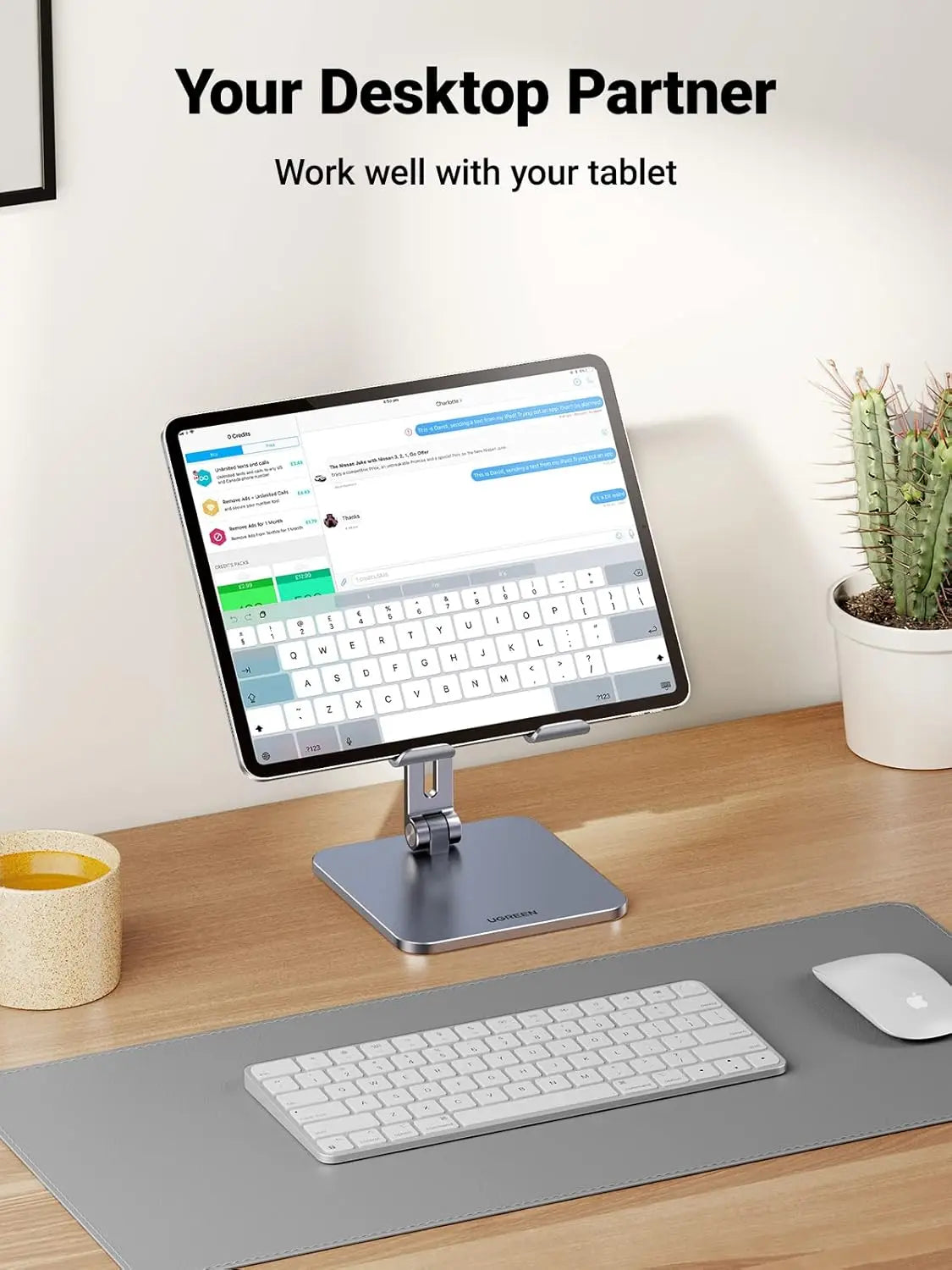 Desktop setup with monitor, keyboard, and mouse on a wooden desk.