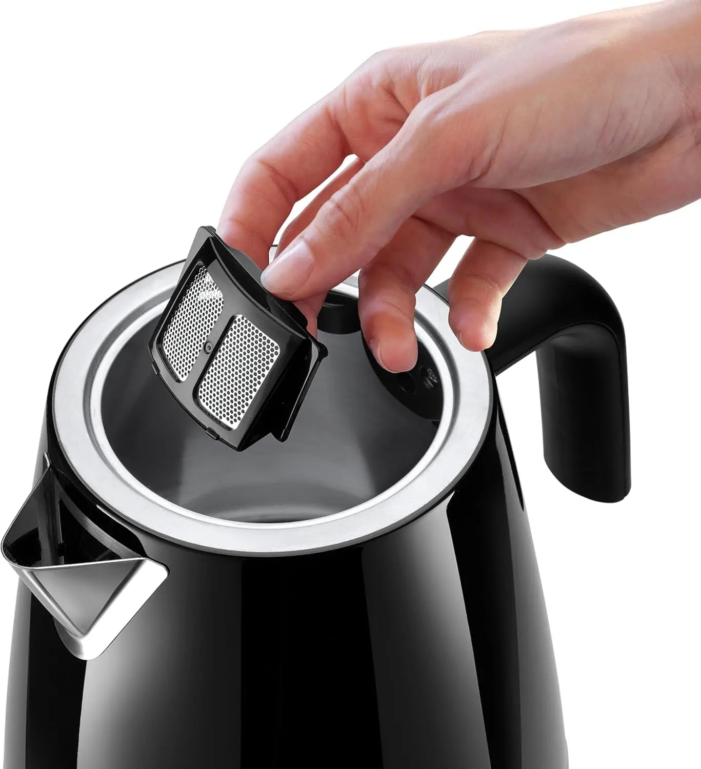 Black electric kettle with a hand holding a black and silver filter.