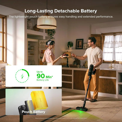Man and woman in a kitchen with a vacuum cleaner and battery graphic, emphasizing long-lasting detachable battery.