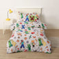 Children's bed with colorful bedding featuring cartoon characters and symbols.