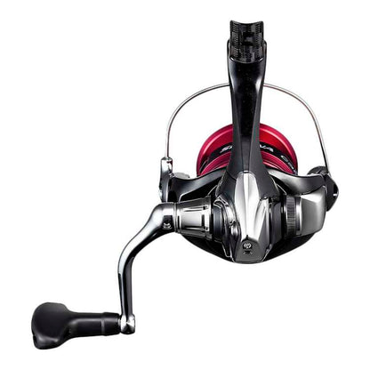 Fishing reel with metallic finish on a white background