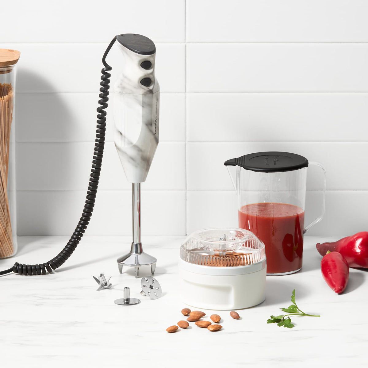 Bamix Swissline Hand Blender 200W White Marble upright beside one litre jug of tomato blend