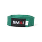 A green martial arts belt rolled up, featuring a black label with the white and red 'SMAI' logo.