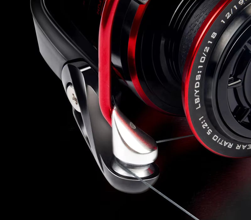 Close-up of the KastKing Sharky III bail arm and spool edge showing engraved gear ratio and line capacity markings
