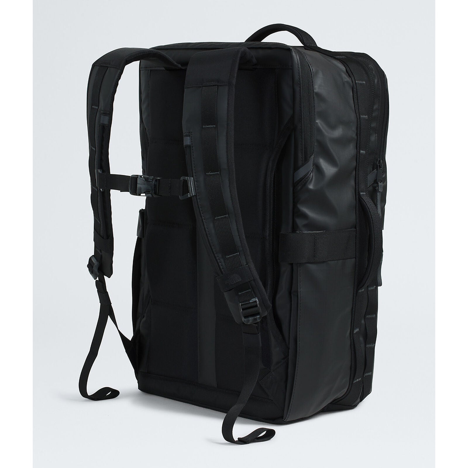 Black backpack on a light gray background