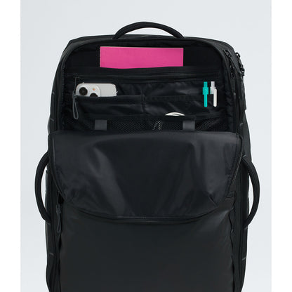 Black backpack with organized compartments on a white background