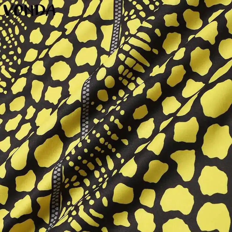 Close-up of a fabric with a black and yellow pattern, featuring the brand 'VONDA'.
