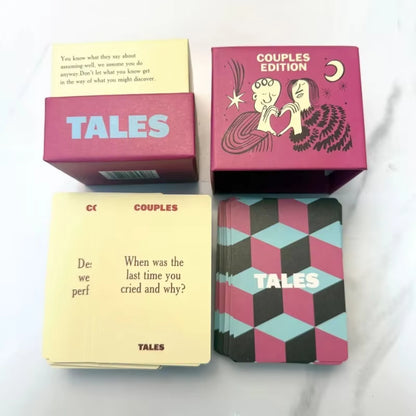 TALES Couples Edition box open with card deck and question cards displayed on a marble surface