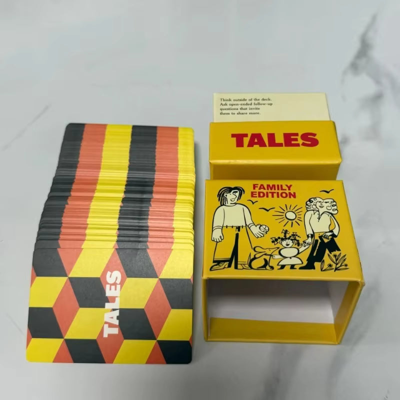 Full deck of TALES Family Edition cards beside the open cube box