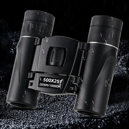 Black binoculars with water droplets on a dark textured background