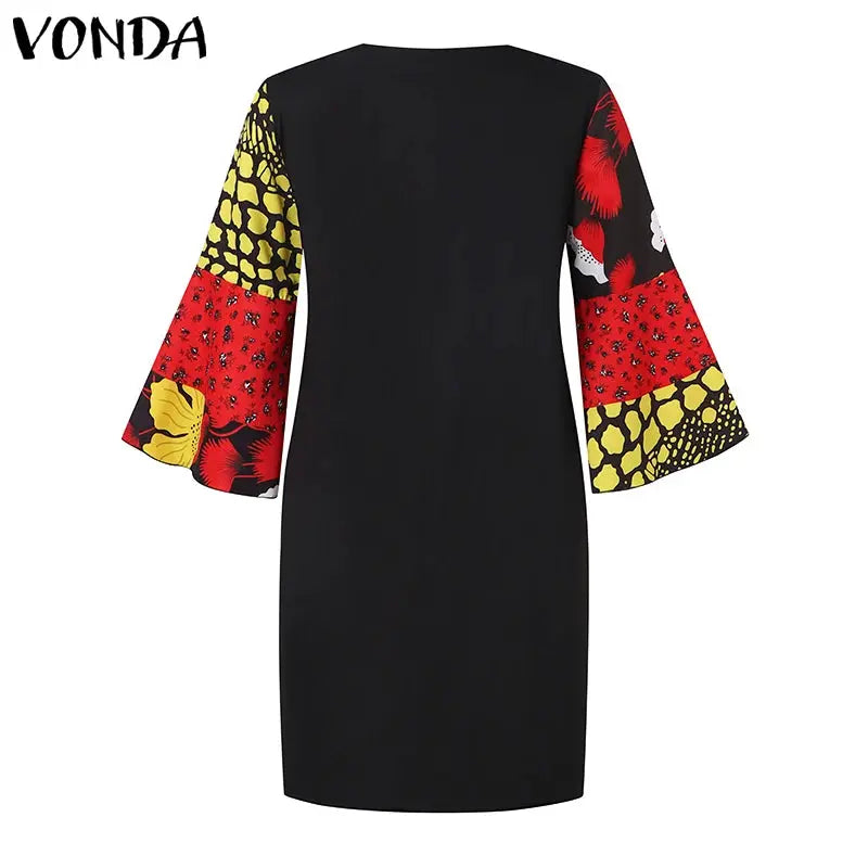 Black dress with colorful bell sleeves on a white background, featuring the brand 'Vonda'.