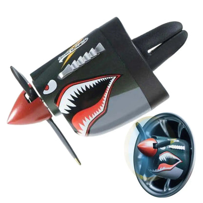 Toy airplane with shark design on a white background