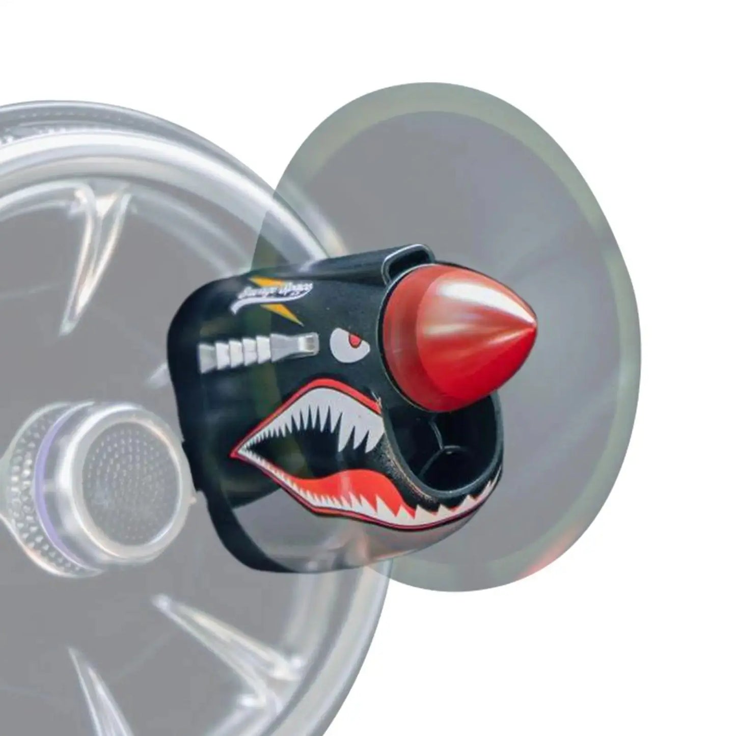 Car valve cap with shark design on a white background