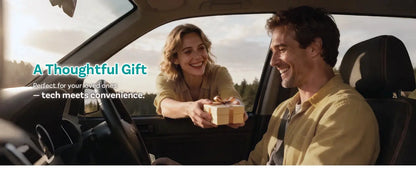 Man and woman in a car, man handing a gift to woman with scenic background