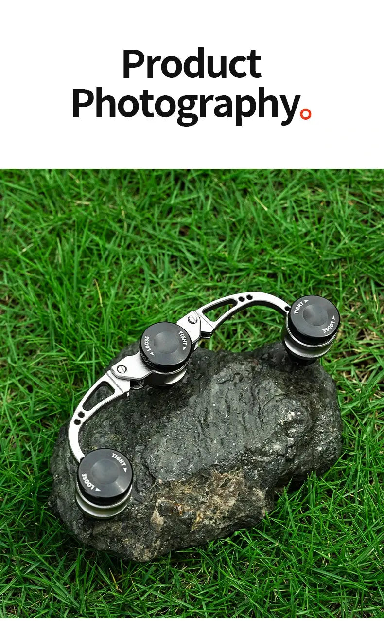 Metallic object on a rock with grass background, labeled 'Product Photography'.