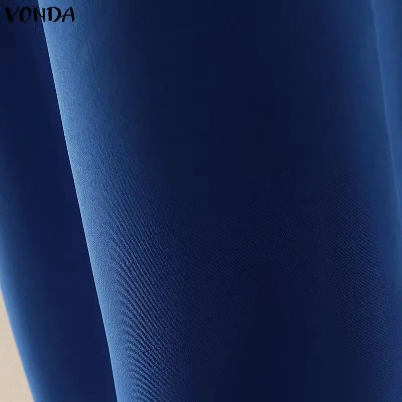 Close-up of blue fabric with 'VONDA' branding.