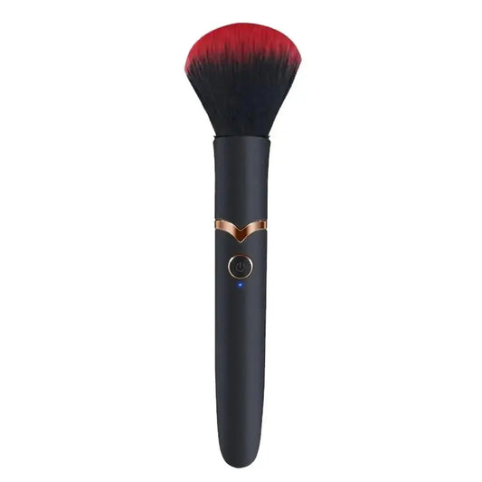Makeup brush with black handle and red bristle head on a white background