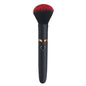 Makeup brush with black handle and red bristle head on a white background
