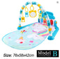 Colorful baby play gym with toys on a white background