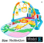 Colorful baby play gym with animals and toys on a white background