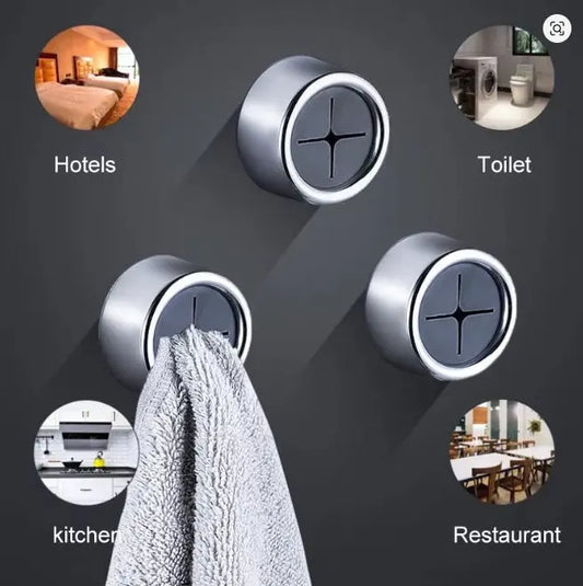 Metallic wall hooks with images of hotel, toilet, kitchen, and restaurant environments.